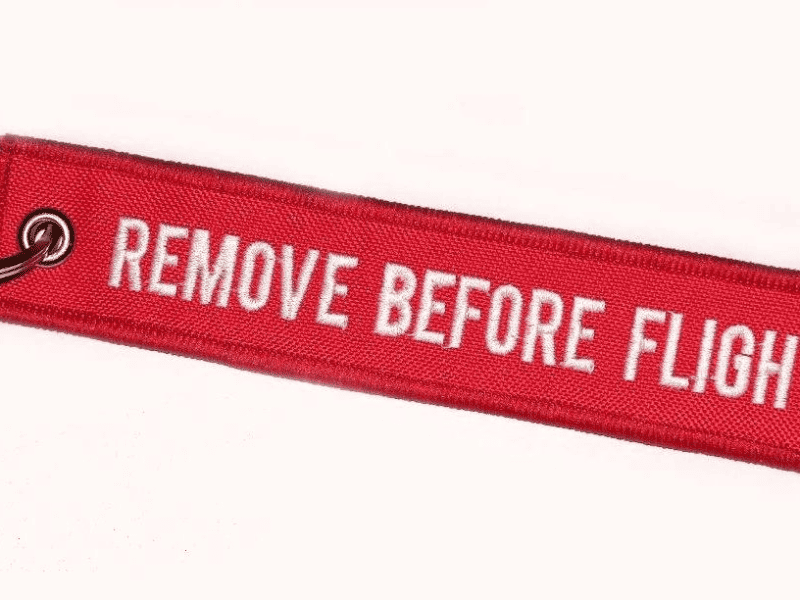 Chaveiro Bordado REMOVE BEFORE FLIGHT