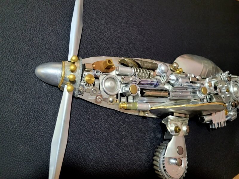 Quadro do Avião P-51 Mustang em 3D feito em metal reciclável de eletrônicos.
