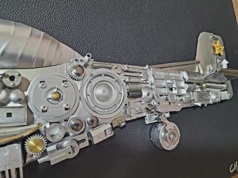Quadro do Avião P-51 Mustang em 3D feito em metal reciclável de eletrônicos.